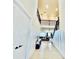Welcoming foyer with high ceilings, tiled floors, staircase with iron railing, and open view to the living area at 4512 Cutwater Dr, Orlando, FL 32820