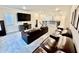 Well-appointed theater room with leather seating, surround sound, and a large screen TV at 4512 Cutwater Dr, Orlando, FL 32820
