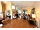 Spacious living room with hardwood floors and neutral wall colors and vaulted ceiling at 4638 River Ridge Dr, Leesburg, FL 34748