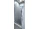 This bathroom showcases an enclosed shower with a sleek design at 4730 Capital Blvd, St Cloud, FL 34769