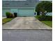 Exterior view of garages and driveways at 4730 Capital Blvd, St Cloud, FL 34769