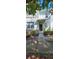 Home's front exterior with manicured landscaping at 4730 Capital Blvd, St Cloud, FL 34769