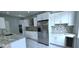 Beautiful kitchen with stainless steel appliances, granite countertops, and breakfast bar with barstool seating at 4730 Capital Blvd, St Cloud, FL 34769
