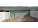 Back patio of property including dividing fence at 4730 Capital Blvd, St Cloud, FL 34769