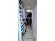 This walk-in closet features custom shelving and ample storage space at 4730 Capital Blvd, St Cloud, FL 34769