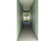 View of walkway between units at 4730 Capital Blvd, St Cloud, FL 34769