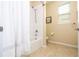 Bathroom with shower and tub combo at 6008 Golden Dewdrop Trl, Windermere, FL 34786