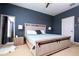 Well-lit bedroom with a modern full-length mirror and decor at 6008 Golden Dewdrop Trl, Windermere, FL 34786