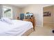Bright bedroom with a large window and a comfortable bed for restful sleep at 6008 Golden Dewdrop Trl, Windermere, FL 34786
