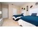 Bedroom with two beds and sports decor at 6008 Golden Dewdrop Trl, Windermere, FL 34786