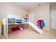 bedroom featuring a loft bed with a slide at 6008 Golden Dewdrop Trl, Windermere, FL 34786