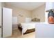 Comfortable bedroom with natural light and neutral tones for a relaxing atmosphere at 6008 Golden Dewdrop Trl, Windermere, FL 34786