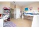 Bedroom featuring plush carpet, bright natural light, study area, and playful decor elements at 6008 Golden Dewdrop Trl, Windermere, FL 34786