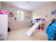 bedroom with a fun loft bed and a slide feature at 6008 Golden Dewdrop Trl, Windermere, FL 34786