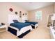 Bedroom with two beds and sports decor at 6008 Golden Dewdrop Trl, Windermere, FL 34786