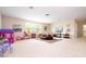 Spacious bonus room with ample lighting, a large window and neutral walls and carpeting at 6008 Golden Dewdrop Trl, Windermere, FL 34786
