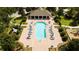 Resort-style community pool with ample lounge seating for residents' relaxation at 6008 Golden Dewdrop Trl, Windermere, FL 34786