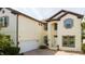 Spacious two-story home with a brick driveway and an attached two-car garage at 6008 Golden Dewdrop Trl, Windermere, FL 34786