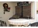Outdoor grill and bar area on a covered patio with wicker chairs and sink at 6008 Golden Dewdrop Trl, Windermere, FL 34786