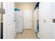 Pantry with white cabinets, tile flooring and plenty of storage space at 6008 Golden Dewdrop Trl, Windermere, FL 34786