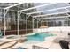 Enclosed private pool and spa area featuring seating, and mature bamboo at 6008 Golden Dewdrop Trl, Windermere, FL 34786