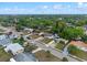 Aerial view of a neighborhood featuring a single-Gathering home with a red-lined property boundary at 6031 W Ridgewood Ave, Orlando, FL 32835