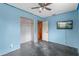 The bedroom provides ample closet space, natural lighting from the window, and an open design for personalization at 6031 W Ridgewood Ave, Orlando, FL 32835