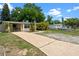 Charming single-story home featuring a well-maintained front yard with long driveway and additional parking spaces at 6031 W Ridgewood Ave, Orlando, FL 32835