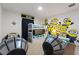 ' bedroom with Minion-themed decor, including bunk beds and unique car-shaped beds at 7012 Oakwood St, Davenport, FL 33837