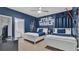 Fun bedroom with Star Wars themed decor, two beds, and ample space at 7012 Oakwood St, Davenport, FL 33837