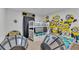 Fun, whimsical bedroom featuring a bunk bed and two twin beds with a Minions theme at 7012 Oakwood St, Davenport, FL 33837