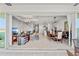 Open floor plan with living, dining, and kitchen areas offers seamless flow and modern design at 7633 Agrigento St, Clermont, FL 34714