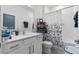 Clean bathroom with modern sink, vanity, and bath/shower combo at 861 Grazie Loop, Davenport, FL 33837