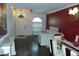 Well-lit living room and dining area featuring elegant decor and ample seating space at 908 Hilly Bend Dr, Apopka, FL 32712