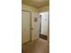 Bedroom with a closet and an open doorway to another room at 1011 Beulah Dr, Edgewater, FL 32132