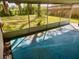 Enclosed patio overlooking a large, fenced-in yard at 1011 Beulah Dr, Edgewater, FL 32132