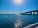 A bright, sunny view of the water and a bridge at 1011 Beulah Dr, Edgewater, FL 32132