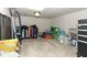 Tiled basement with a variety of stored items and cleaning supplies at 1011 Cedar Bay Ln, Winter Springs, FL 32708