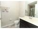 Clean bathroom featuring a vanity, mirror, toilet, and a shower with glass doors at 1011 Cedar Bay Ln, Winter Springs, FL 32708