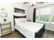 Inviting bedroom with a large window overlooking a serene pond for a tranquil view at 1011 Cedar Bay Ln, Winter Springs, FL 32708