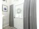 Bright entryway featuring a glass-paneled door with blinds and elegant gray curtains for added privacy at 1011 Cedar Bay Ln, Winter Springs, FL 32708