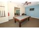 Game room with pool table, tv, and easy access to the exercise room offering multiple options for recreation at 1011 Cedar Bay Ln, Winter Springs, FL 32708