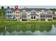 Beautiful townhome overlooking a peaceful pond with water reflection views at 1011 Cedar Bay Ln, Winter Springs, FL 32708