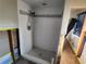 Bathroom featuring a walk-in shower, showcasing renovation work at 1019 Chippewa Trl, Daytona Beach, FL 32117