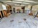 Spacious garage with water heater, storage cabinets, and ample room for projects at 1019 Chippewa Trl, Daytona Beach, FL 32117