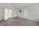 Open laundry room featuring a white washer and dryer with access to the exterior at 1179 Seminole St, Clermont, FL 34711