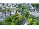 Aerial view of a neighborhood showcasing lush landscaping and well-maintained homes at 1213 Brampton Pl, Lake Mary, FL 32746