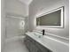 Bright bathroom with a glass vessel sink, modern vanity, shower and toilet at 1213 Brampton Pl, Lake Mary, FL 32746