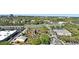 Aerial view of the community featuring a miniature golf course surrounded by lush landscaping and green spaces at 13427 Blue Heron Beach Dr # 1802, Orlando, FL 32821