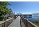 Scenic view of the community dock and gazebo, perfect for waterfront relaxation and enjoying lake views at 13427 Blue Heron Beach Dr # 1802, Orlando, FL 32821